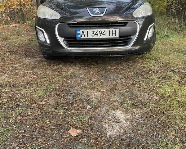 Коричневый Пежо 308, объемом двигателя 1.6 л и пробегом 142 тыс. км за 6000 $, фото 1 на Automoto.ua