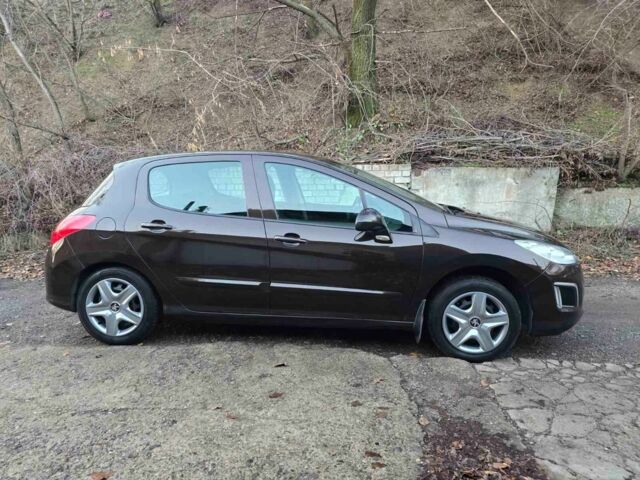 Коричневый Пежо 308, объемом двигателя 1.6 л и пробегом 143 тыс. км за 6600 $, фото 1 на Automoto.ua
