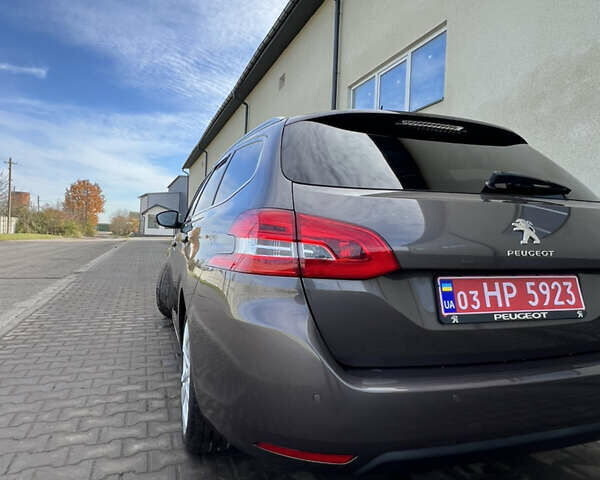 Коричневый Пежо 308, объемом двигателя 2 л и пробегом 240 тыс. км за 11300 $, фото 10 на Automoto.ua