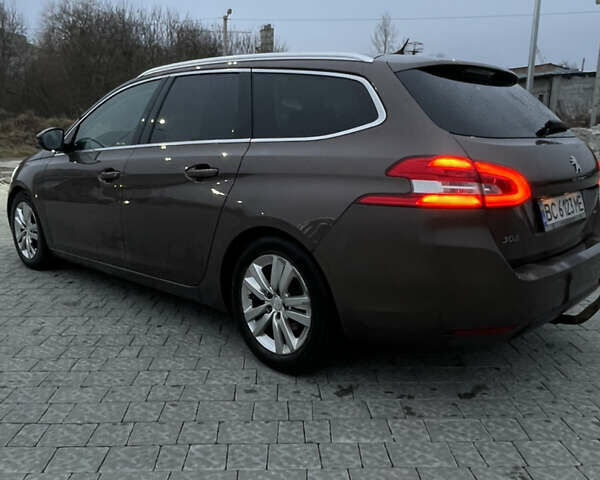 Коричневый Пежо 308, объемом двигателя 1.56 л и пробегом 309 тыс. км за 8000 $, фото 13 на Automoto.ua