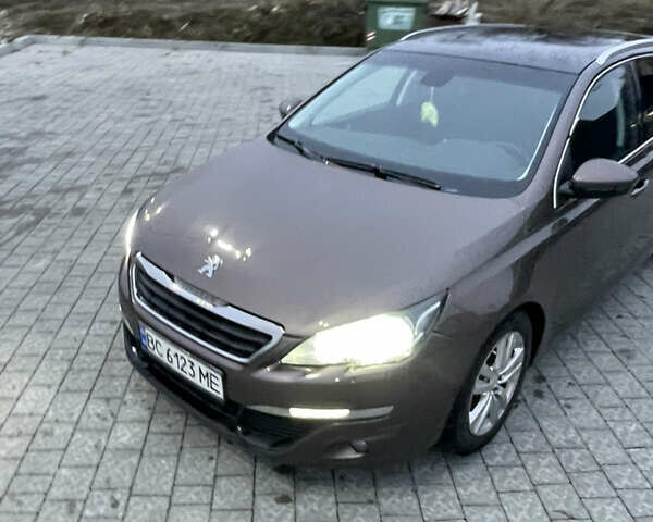 Коричневый Пежо 308, объемом двигателя 1.56 л и пробегом 309 тыс. км за 8000 $, фото 1 на Automoto.ua