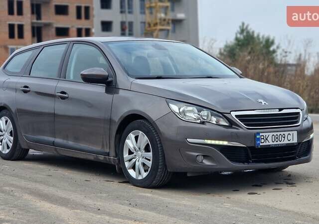 Пежо 308 2014 в Ровно на Automoto.ua Коричневый Пежо 308, объемом двигателя 1.56 л и пробегом 252 тыс. км за 9200 $, фото 6 на Automoto.ua
