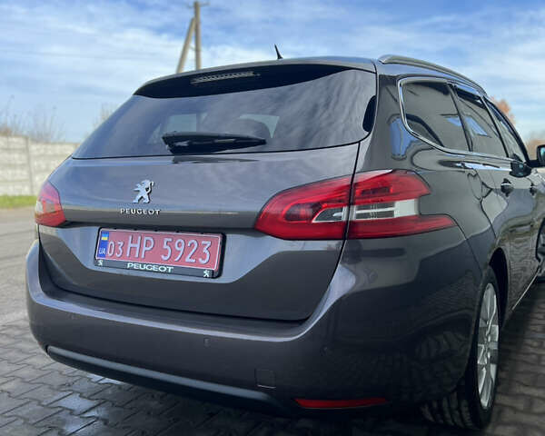 Коричневый Пежо 308, объемом двигателя 2 л и пробегом 240 тыс. км за 11300 $, фото 15 на Automoto.ua