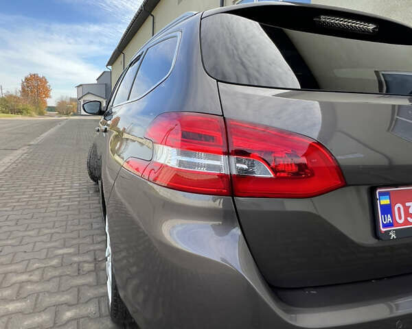 Коричневый Пежо 308, объемом двигателя 2 л и пробегом 240 тыс. км за 11300 $, фото 11 на Automoto.ua