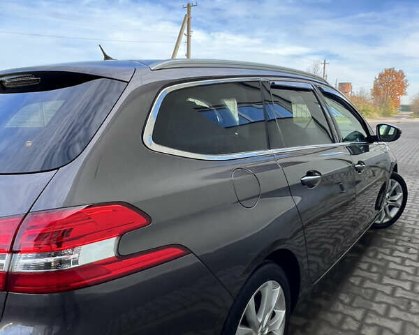 Коричневый Пежо 308, объемом двигателя 2 л и пробегом 240 тыс. км за 11300 $, фото 18 на Automoto.ua