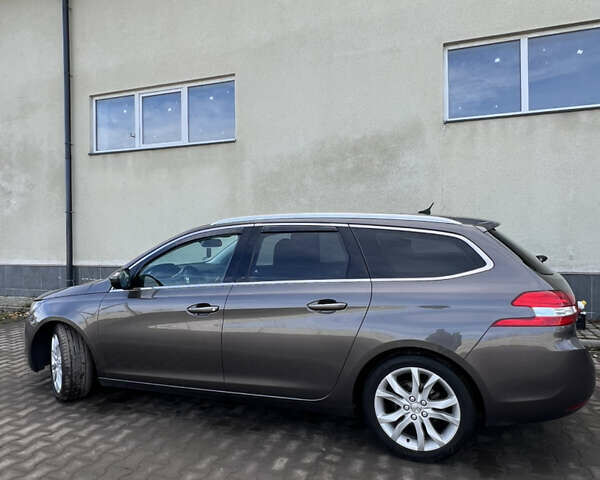 Коричневый Пежо 308, объемом двигателя 2 л и пробегом 240 тыс. км за 11300 $, фото 6 на Automoto.ua