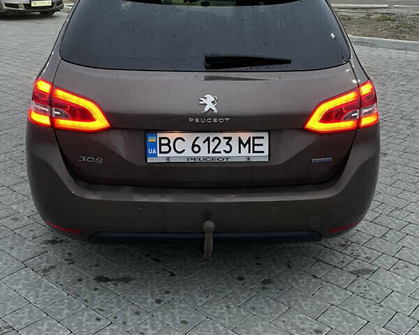 Коричневый Пежо 308, объемом двигателя 1.56 л и пробегом 309 тыс. км за 8000 $, фото 11 на Automoto.ua