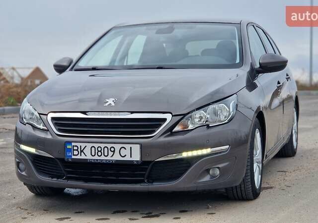 Пежо 308 2014 в Ровно на Automoto.ua Коричневый Пежо 308, объемом двигателя 1.56 л и пробегом 252 тыс. км за 9200 $, фото 5 на Automoto.ua
