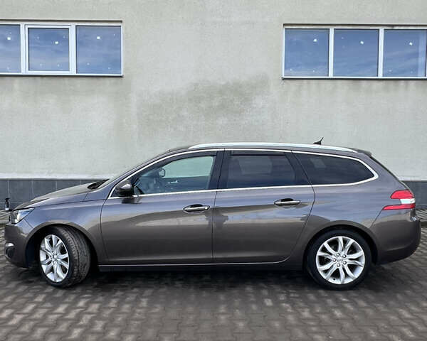 Коричневый Пежо 308, объемом двигателя 2 л и пробегом 240 тыс. км за 11300 $, фото 5 на Automoto.ua