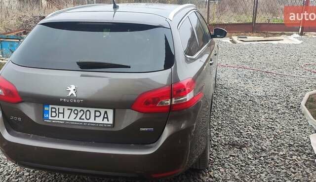Коричневый Пежо 308, объемом двигателя 1.56 л и пробегом 300 тыс. км за 8555 $, фото 4 на Automoto.ua