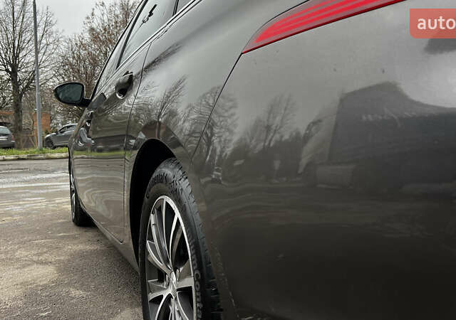 Коричневый Пежо 308, объемом двигателя 2 л и пробегом 140 тыс. км за 11999 $, фото 5 на Automoto.ua