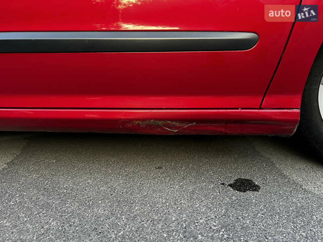 Красный Пежо 308, объемом двигателя 1.6 л и пробегом 159 тыс. км за 5500 $, фото 17 на Automoto.ua