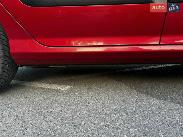 Красный Пежо 308, объемом двигателя 1.6 л и пробегом 159 тыс. км за 5500 $, фото 18 на Automoto.ua