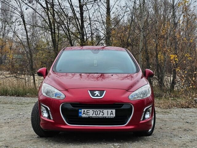 Красный Пежо 308, объемом двигателя 1.6 л и пробегом 97 тыс. км за 6500 $, фото 1 на Automoto.ua