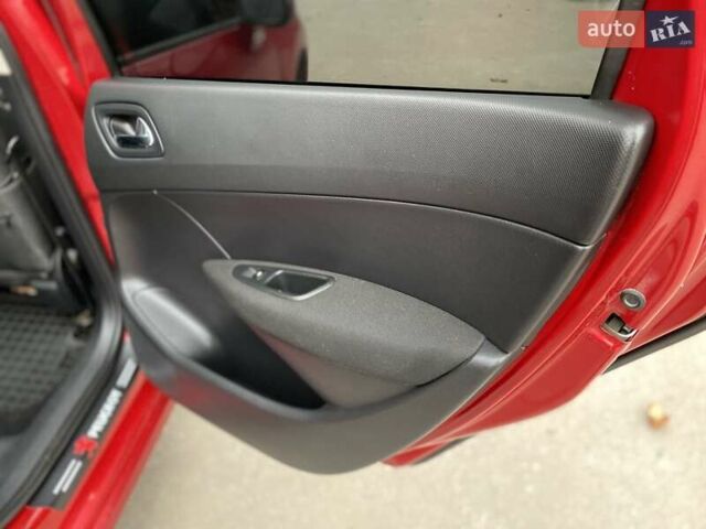 Красный Пежо 308, объемом двигателя 1.6 л и пробегом 170 тыс. км за 4888 $, фото 18 на Automoto.ua