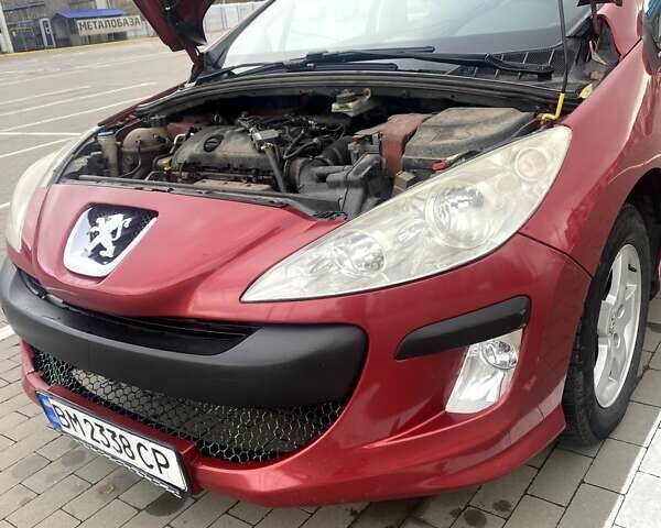 Красный Пежо 308, объемом двигателя 1.4 л и пробегом 279 тыс. км за 3700 $, фото 19 на Automoto.ua