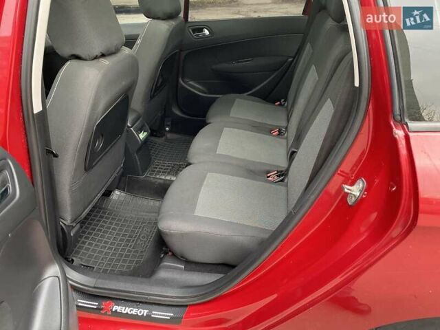 Красный Пежо 308, объемом двигателя 1.6 л и пробегом 170 тыс. км за 4888 $, фото 17 на Automoto.ua