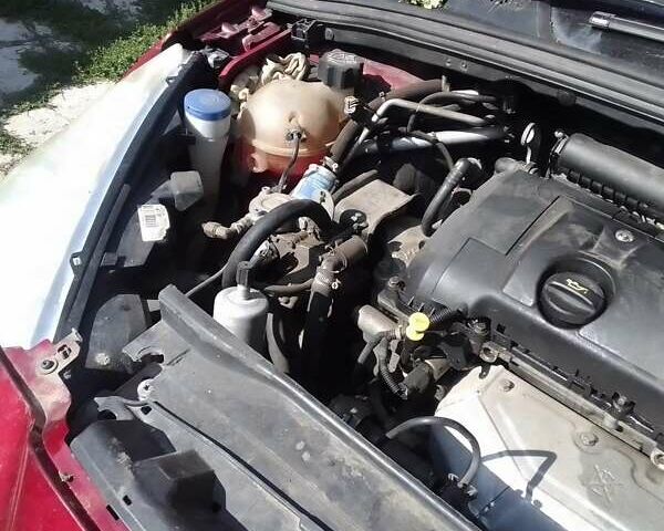 Красный Пежо 308, объемом двигателя 1.6 л и пробегом 170 тыс. км за 3000 $, фото 6 на Automoto.ua