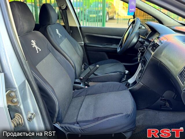 Пежо 308, объемом двигателя 1.4 л и пробегом 295 тыс. км за 3300 $, фото 7 на Automoto.ua