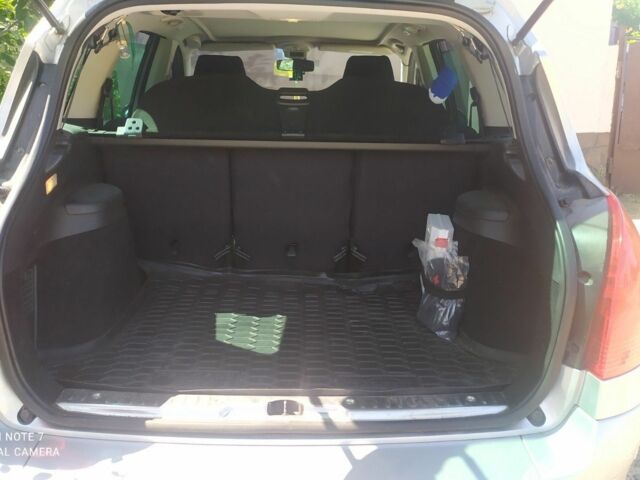 Серый Пежо 308, объемом двигателя 1.6 л и пробегом 165 тыс. км за 6200 $, фото 13 на Automoto.ua