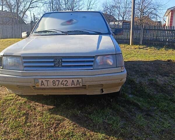 Серый Пежо 308, объемом двигателя 1.9 л и пробегом 300 тыс. км за 799 $, фото 4 на Automoto.ua