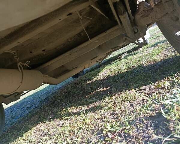 Серый Пежо 308, объемом двигателя 1.9 л и пробегом 300 тыс. км за 799 $, фото 1 на Automoto.ua