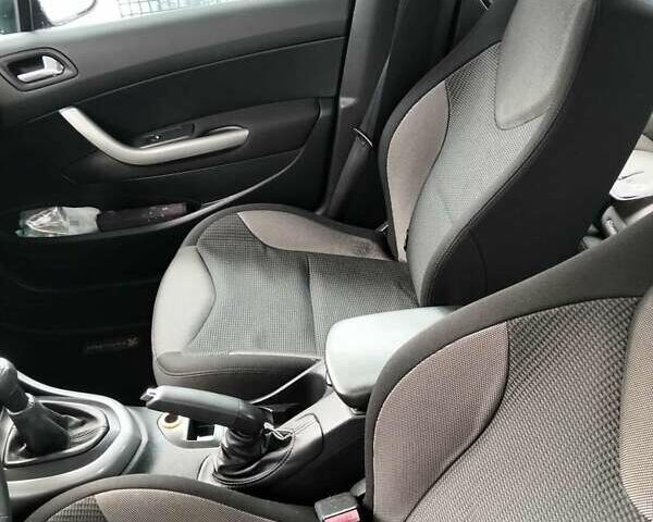 Серый Пежо 308, объемом двигателя 1.6 л и пробегом 235 тыс. км за 5000 $, фото 7 на Automoto.ua