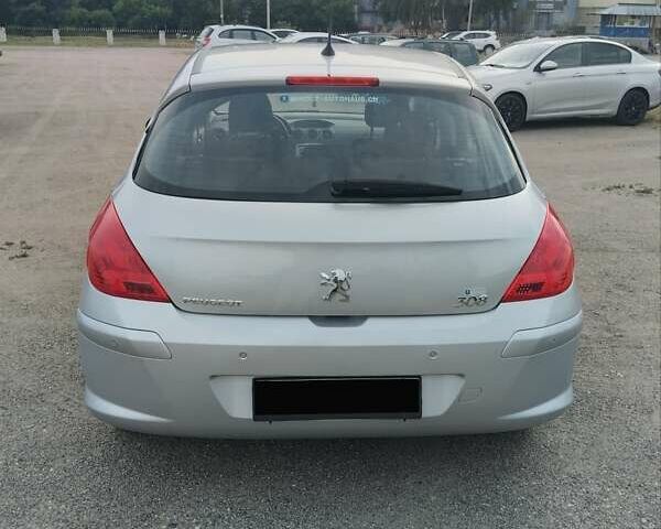 Серый Пежо 308, объемом двигателя 1.6 л и пробегом 155 тыс. км за 6000 $, фото 5 на Automoto.ua