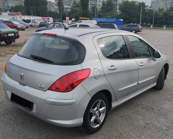 Серый Пежо 308, объемом двигателя 1.6 л и пробегом 155 тыс. км за 6000 $, фото 6 на Automoto.ua