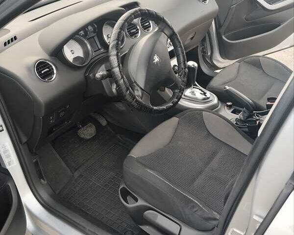 Серый Пежо 308, объемом двигателя 1.6 л и пробегом 155 тыс. км за 6000 $, фото 9 на Automoto.ua