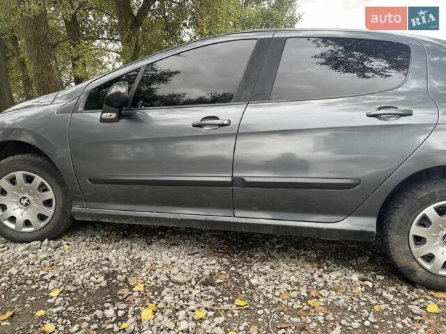 Серый Пежо 308, объемом двигателя 1.6 л и пробегом 188 тыс. км за 4300 $, фото 1 на Automoto.ua