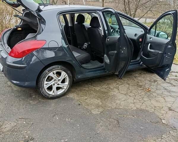 Серый Пежо 308, объемом двигателя 1.6 л и пробегом 228 тыс. км за 5100 $, фото 11 на Automoto.ua