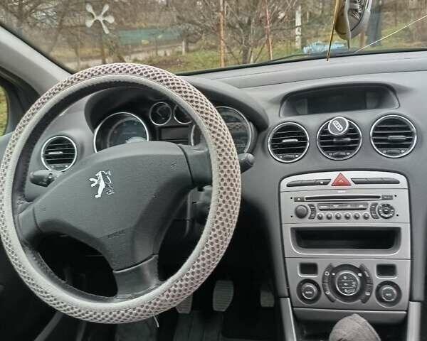 Серый Пежо 308, объемом двигателя 1.6 л и пробегом 228 тыс. км за 5100 $, фото 8 на Automoto.ua