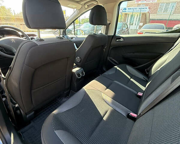 Серый Пежо 308, объемом двигателя 1.6 л и пробегом 165 тыс. км за 6200 $, фото 13 на Automoto.ua