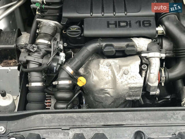 Серый Пежо 308, объемом двигателя 1.56 л и пробегом 340 тыс. км за 5400 $, фото 12 на Automoto.ua