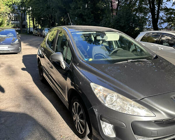 Серый Пежо 308, объемом двигателя 1.6 л и пробегом 221 тыс. км за 3900 $, фото 1 на Automoto.ua