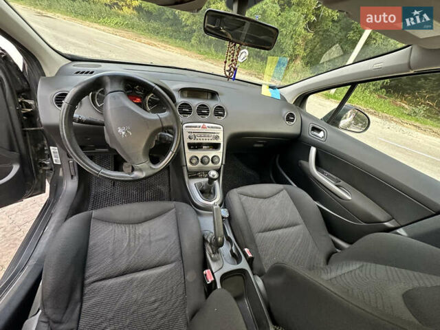 Серый Пежо 308, объемом двигателя 1.6 л и пробегом 221 тыс. км за 3900 $, фото 12 на Automoto.ua