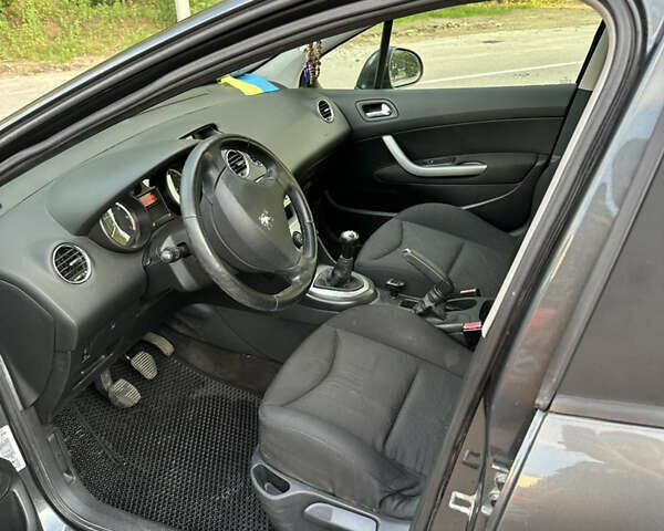 Серый Пежо 308, объемом двигателя 1.6 л и пробегом 221 тыс. км за 3900 $, фото 9 на Automoto.ua