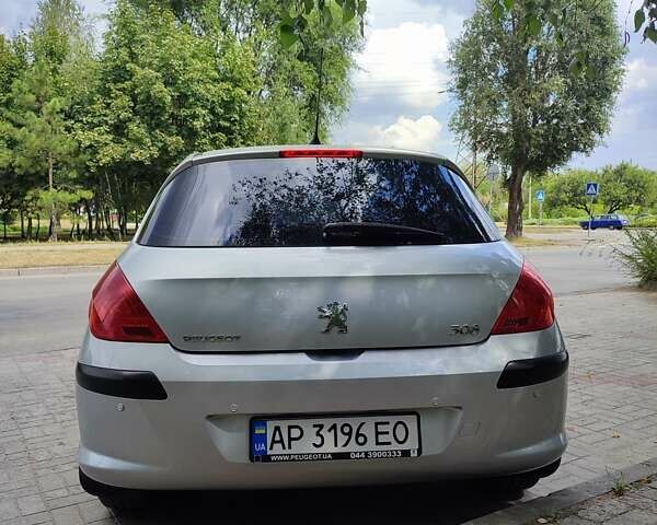Серый Пежо 308, объемом двигателя 1.56 л и пробегом 146 тыс. км за 7500 $, фото 14 на Automoto.ua