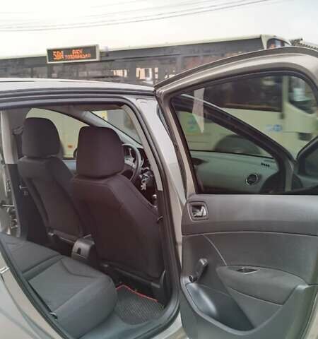 Серый Пежо 308, объемом двигателя 1.4 л и пробегом 175 тыс. км за 6700 $, фото 14 на Automoto.ua