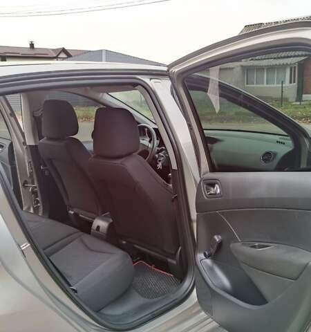 Серый Пежо 308, объемом двигателя 1.4 л и пробегом 175 тыс. км за 6700 $, фото 15 на Automoto.ua