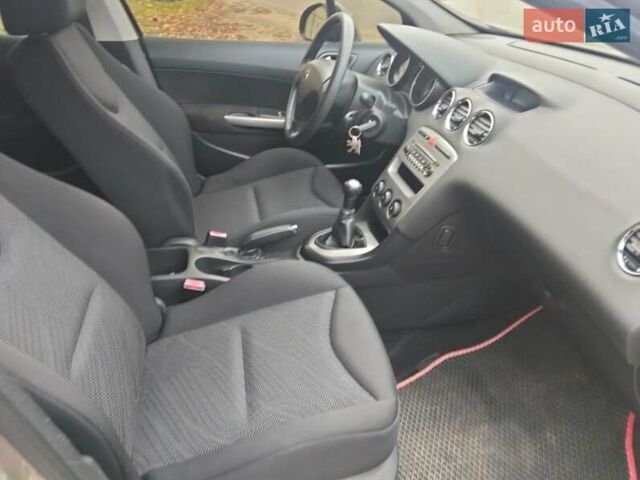 Серый Пежо 308, объемом двигателя 1.4 л и пробегом 175 тыс. км за 6700 $, фото 23 на Automoto.ua