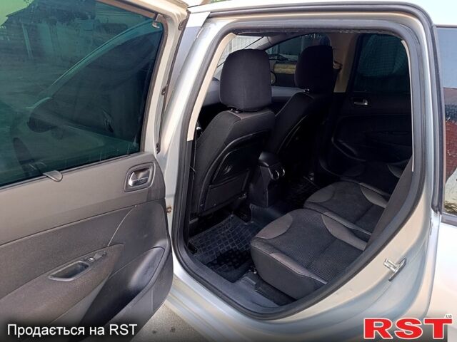 Серый Пежо 308, объемом двигателя 1.6 л и пробегом 350 тыс. км за 4000 $, фото 4 на Automoto.ua