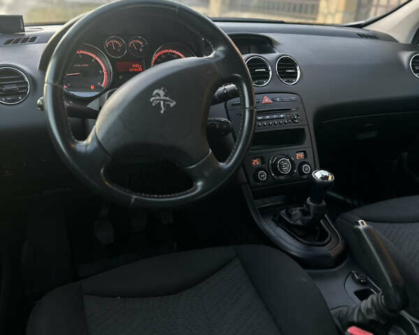 Сірий Пежо 308, об'ємом двигуна 1.6 л та пробігом 229 тис. км за 4999 $, фото 28 на Automoto.ua