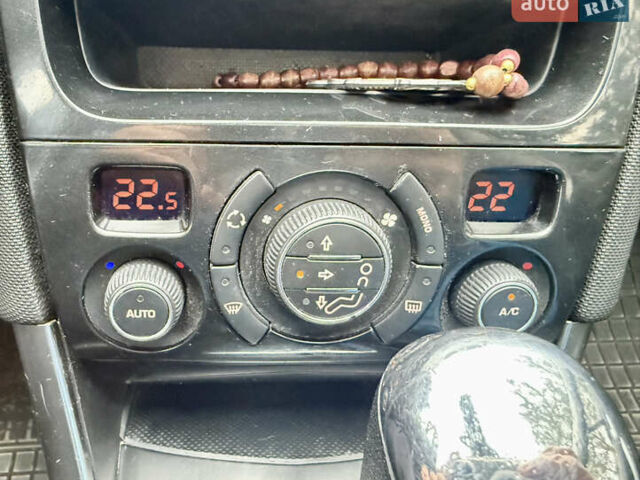 Серый Пежо 308, объемом двигателя 2 л и пробегом 284 тыс. км за 5250 $, фото 15 на Automoto.ua