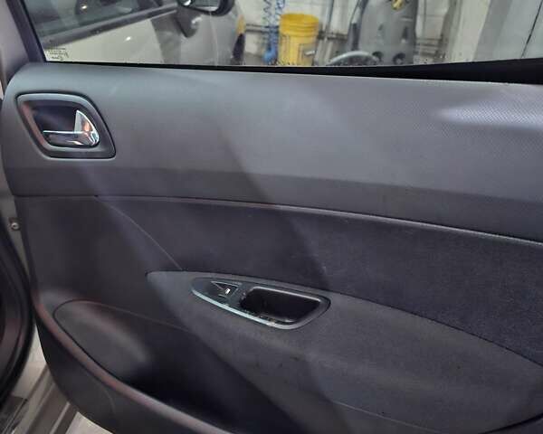 Серый Пежо 308, объемом двигателя 1.56 л и пробегом 260 тыс. км за 8000 $, фото 12 на Automoto.ua