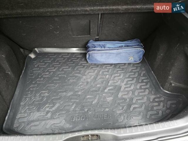 Серый Пежо 308, объемом двигателя 1.56 л и пробегом 260 тыс. км за 8000 $, фото 19 на Automoto.ua