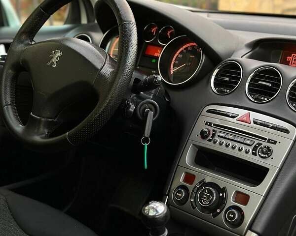 Серый Пежо 308, объемом двигателя 1.6 л и пробегом 237 тыс. км за 4900 $, фото 14 на Automoto.ua