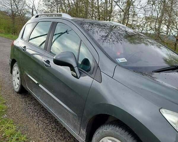 Серый Пежо 308, объемом двигателя 1.6 л и пробегом 259 тыс. км за 5700 $, фото 3 на Automoto.ua