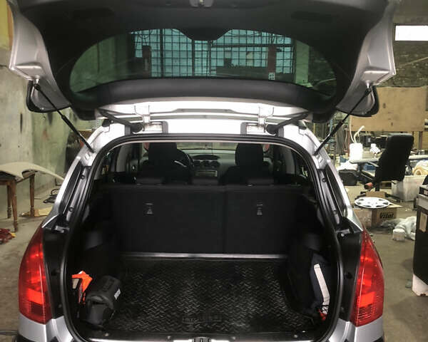 Серый Пежо 308, объемом двигателя 1.6 л и пробегом 237 тыс. км за 5400 $, фото 20 на Automoto.ua